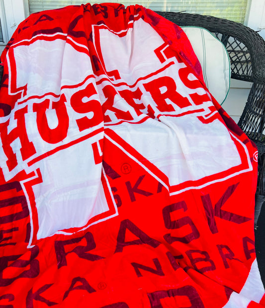 Nebraska 62” x 90” Raschel Throw Blanket